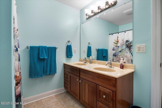 264 Edie Rd, Wilton, NY 12866 - bathroom featuring double vanity, baseboards, and tile patterned floors