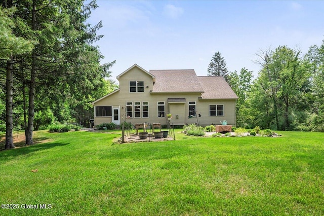 264 Edie Rd, Wilton, NY 12866 - back of house with a lawn, a patio, a fire pit, and a sunroom