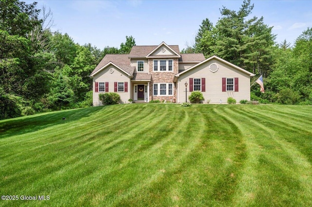 264 Edie Rd, Wilton, NY 12866 - view of front of home featuring a front yard and stone siding