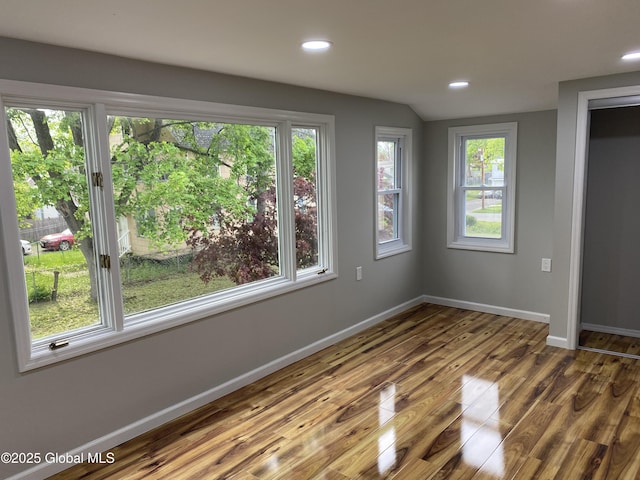 2112 Gray St, Rotterdam, NY 12306 - empty room with wood finished floors, baseboards, and recessed lighting