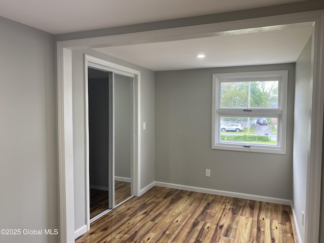 2112 Gray St, Rotterdam, NY 12306 - spare room with wood finished floors, baseboards, and recessed lighting