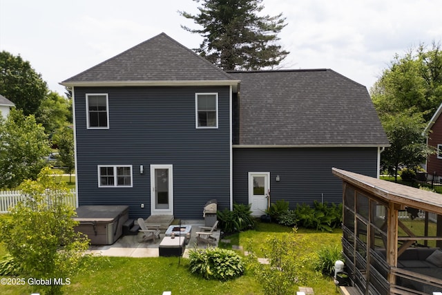 305 W Circular St, Saratoga, NY 12866 - back of property featuring a hot tub, a patio area, and a shingled roof