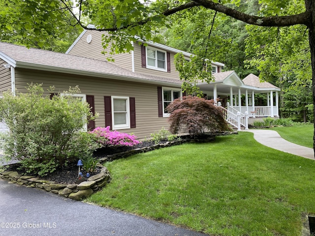 6 Bishops Ct, Queensbury, NY 12804 - view of front of property featuring a porch and a front lawn