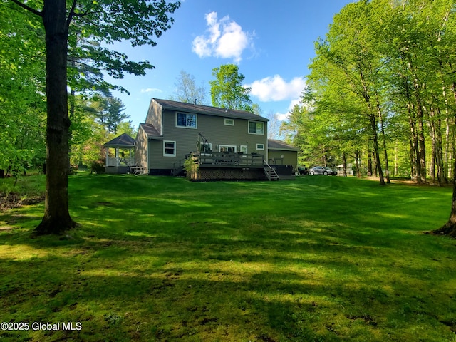 6 Bishops Ct, Queensbury, NY 12804 - back of property featuring a deck and a lawn