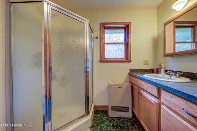 324 County Highway 112, Bleecker, NY 12078 - bathroom featuring a stall shower, vanity, marble look tile flooring, and baseboards