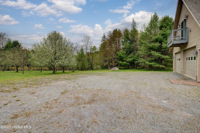 324 County Highway 112, Bleecker, NY 12078 - view of yard with a balcony and a garage