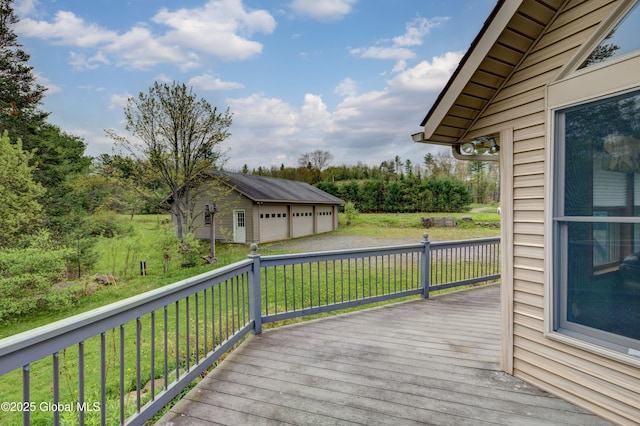 324 County Highway 112, Bleecker, NY 12078 - deck with a detached garage, an outdoor structure, and a lawn