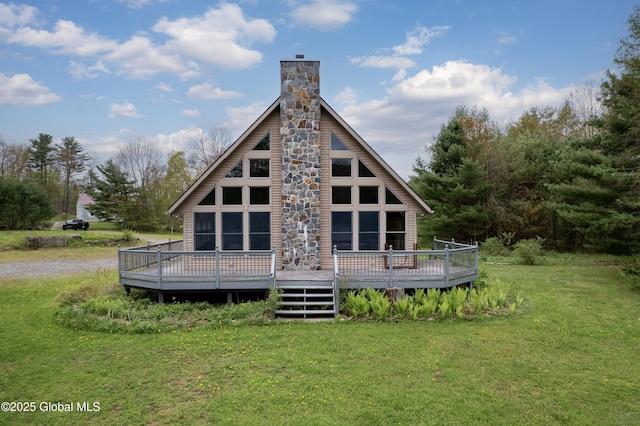 324 County Highway 112, Bleecker, NY 12078 - back of property featuring a lawn, a chimney, and a wooden deck