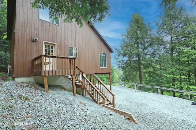 441 E Kelm Pond Rd, Warrensburg, NY 12885 - view of side of home featuring stairs