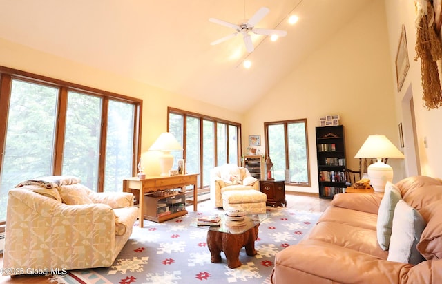 441 E Kelm Pond Rd, Warrensburg, NY 12885 - living area with high vaulted ceiling, a ceiling fan, plenty of natural light, recessed lighting, and wood finished floors