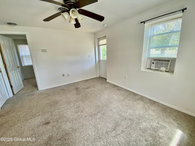6963 Fuller Station Rd, Schenectady, NY 12303 - spare room featuring cooling unit, baseboards, ceiling fan, and carpet