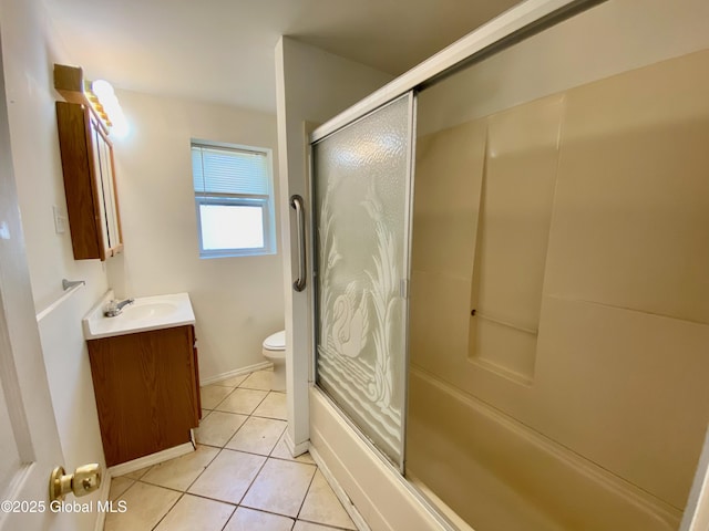 6963 Fuller Station Rd, Schenectady, NY 12303 - full bath with tile patterned flooring, vanity, toilet, and bath / shower combo with glass door