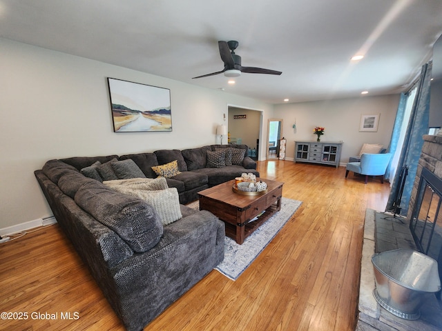 1 Laurel Rd, Moreau, NY 12828 - living area with light wood-style floors, plenty of natural light, ceiling fan, recessed lighting, and a fireplace