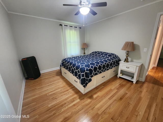 1 Laurel Rd, Moreau, NY 12828 - bedroom featuring light wood finished floors, ornamental molding, baseboards, and a ceiling fan