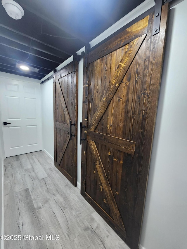 1 Laurel Rd, Moreau, NY 12828 - detailed view of a barn door and wood finished floors