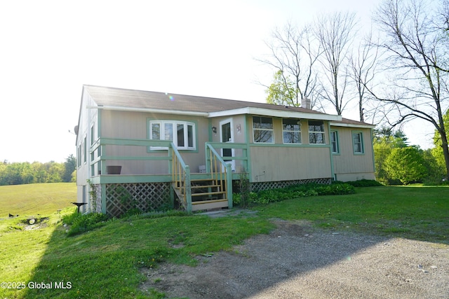 40 W Starbuck Ln, Fort Ann, NY 12827 - view of front of home with a wooden deck and a front lawn