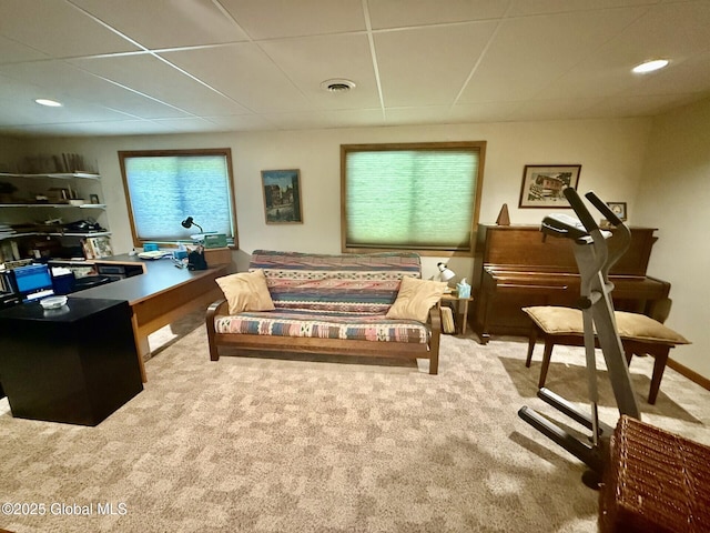 office featuring carpet floors and a paneled ceiling