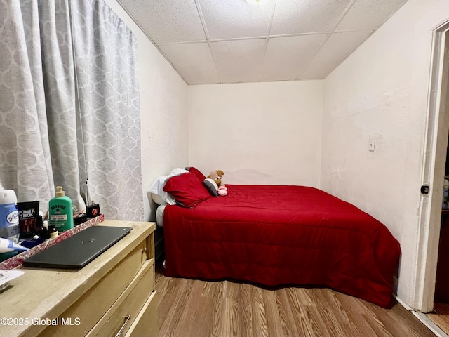 327 9th St, Troy, NY 12180 - bedroom featuring a paneled ceiling and wood finished floors