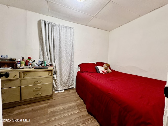 327 9th St, Troy, NY 12180 - bedroom featuring a drop ceiling and light wood-type flooring