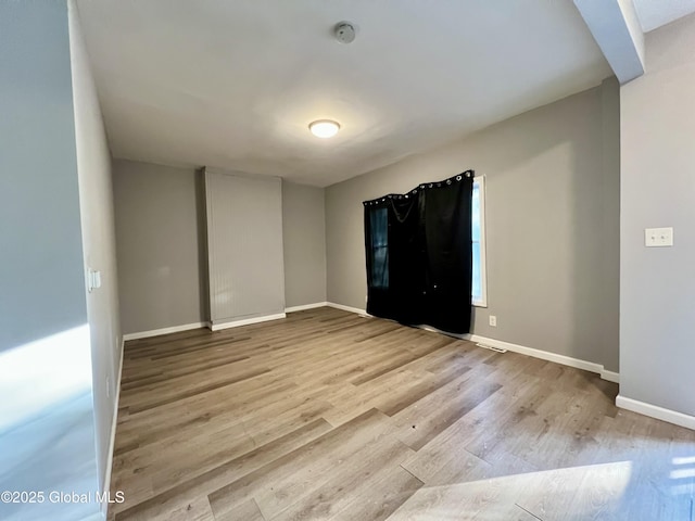 254 2nd St, Albany, NY 12206 - unfurnished room featuring wood finished floors and a smoke detector