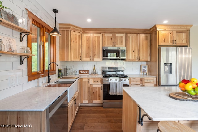 kitchen featuring stainless steel appliances, a sink, tasteful backsplash, open shelves, and pendant lighting