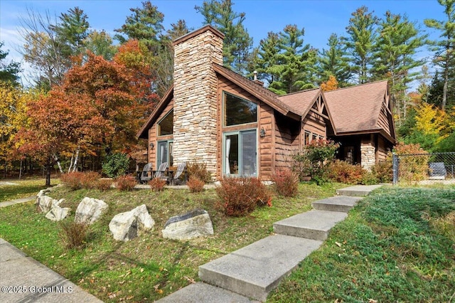 106 Mountain Path, Johnsburg, NY 12853 - view of front of home featuring a chimney and stone siding