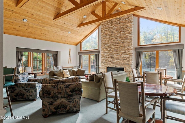 106 Mountain Path, Johnsburg, NY 12853 - carpeted living area with high vaulted ceiling, wood ceiling with exposed beams, a fireplace, and recessed lighting