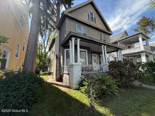 traditional style home with a porch