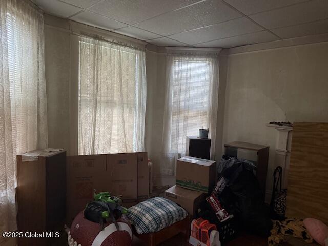miscellaneous room with a paneled ceiling
