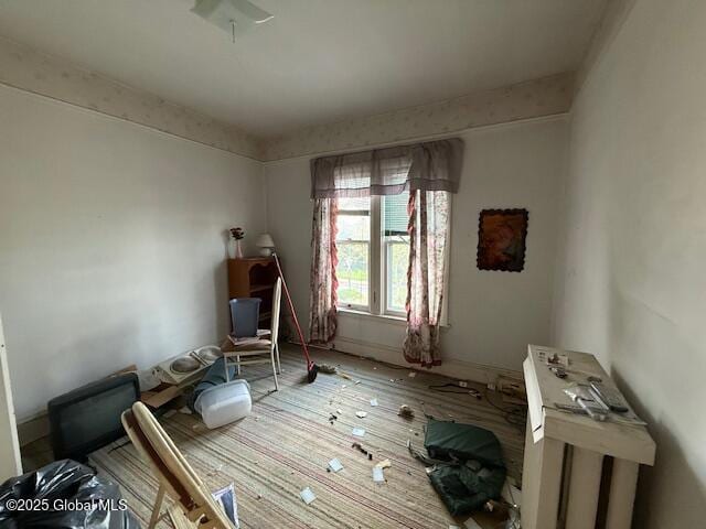 bedroom featuring wood finished floors