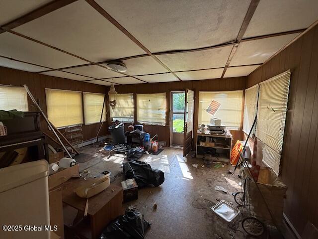 misc room with wooden walls