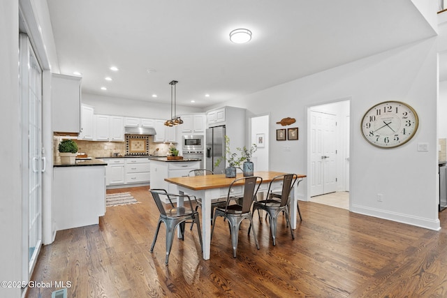 6004 Queen Mary Ct, Schenectady, NY 12303 - dining room featuring light wood-type flooring, recessed lighting, and baseboards