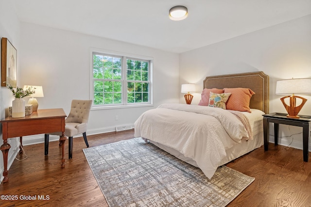 6004 Queen Mary Ct, Schenectady, NY 12303 - bedroom with dark wood-style flooring and baseboards