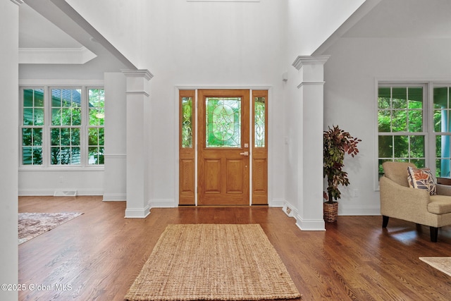 6004 Queen Mary Ct, Schenectady, NY 12303 - foyer featuring ornate columns, wood finished floors, baseboards, and crown molding