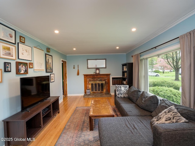 3 E St Stephens Ln, Glenville, NY 12302 - living area with light wood-type flooring, recessed lighting, ornamental molding, a brick fireplace, and baseboards