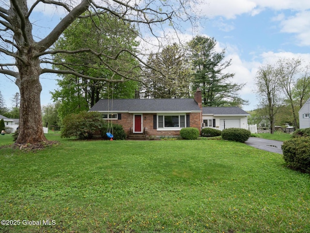 3 E St Stephens Ln, Glenville, NY 12302 - single story home with concrete driveway, a chimney, an attached garage, and a front yard