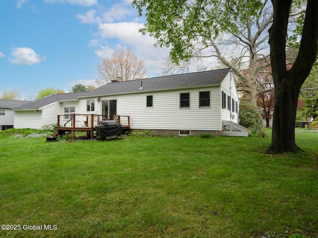 3 E St Stephens Ln, Glenville, NY 12302 - back of house featuring a wooden deck, a lawn, and a chimney