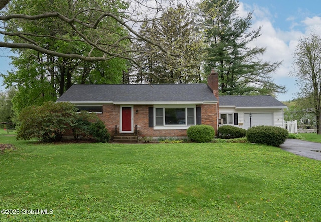 3 E St Stephens Ln, Glenville, NY 12302 - ranch-style house with a garage, asphalt driveway, a chimney, a front lawn, and brick siding