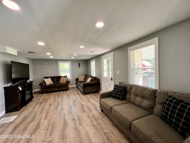 119 Houseman St, Mayfield, NY 12117 - living room with recessed lighting, light wood-style floors, and baseboards