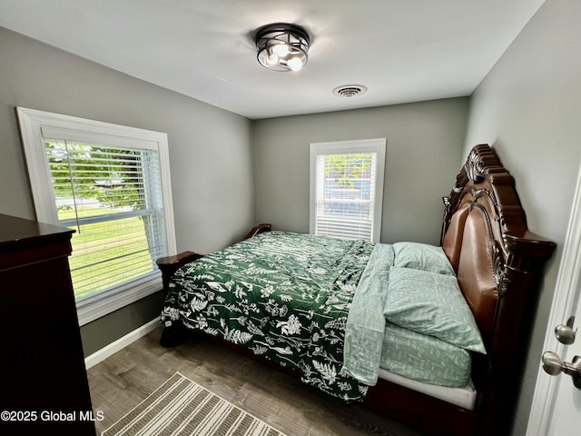 119 Houseman St, Mayfield, NY 12117 - bedroom featuring baseboards and wood finished floors