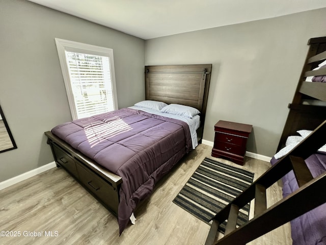 119 Houseman St, Mayfield, NY 12117 - bedroom with light wood-style floors and baseboards