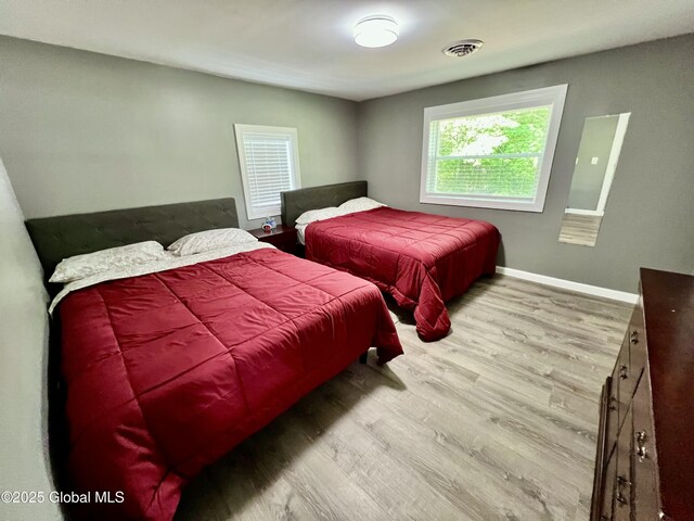 119 Houseman St, Mayfield, NY 12117 - bedroom with wood finished floors and baseboards