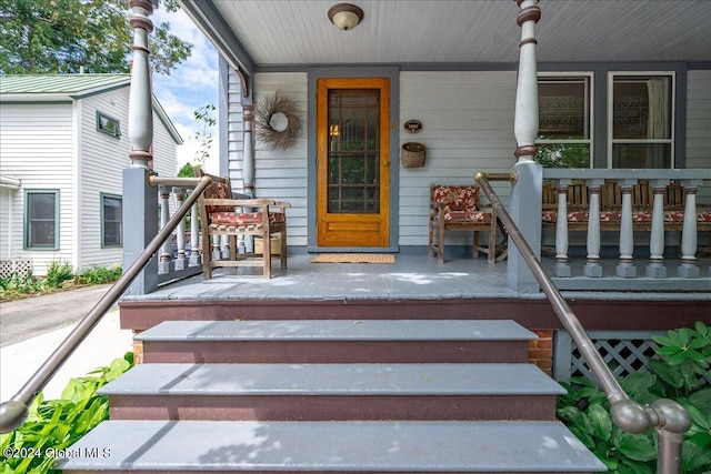 19 George St, Saratoga Springs, Inside, NY 12866 - view of exterior entry featuring a porch