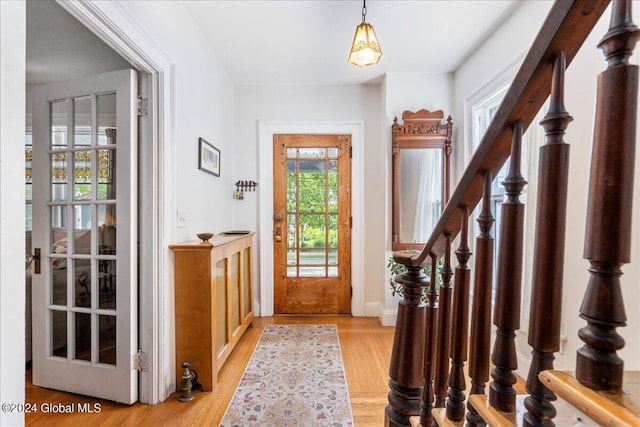19 George St, Saratoga Springs, Inside, NY 12866 - foyer featuring light wood-type flooring, stairway, and baseboards
