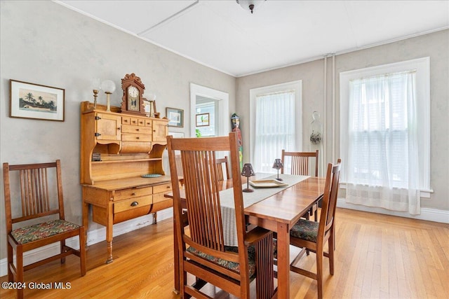 19 George St, Saratoga Springs, Inside, NY 12866 - dining room featuring plenty of natural light, light wood-type flooring, and ornamental molding