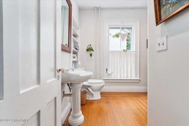 19 George St, Saratoga Springs, Inside, NY 12866 - bathroom featuring baseboards, wood finished floors, and toilet