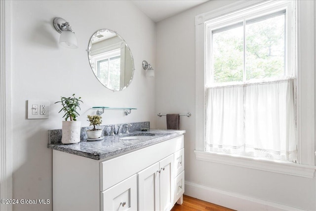 19 George St, Saratoga Springs, Inside, NY 12866 - bathroom featuring vanity, baseboards, and wood finished floors