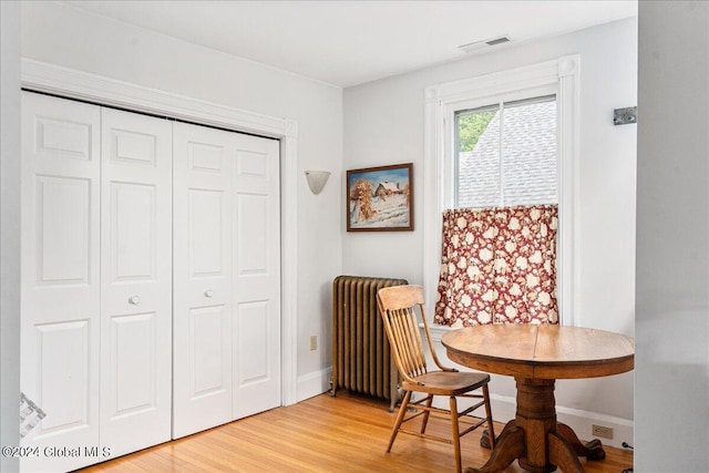 19 George St, Saratoga Springs, Inside, NY 12866 - dining space featuring light wood finished floors, radiator heating unit, and baseboards