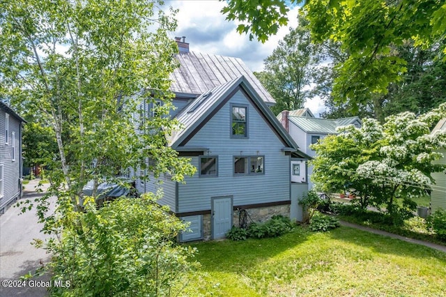 19 George St, Saratoga Springs, Inside, NY 12866 - rear view of house featuring a yard and a chimney