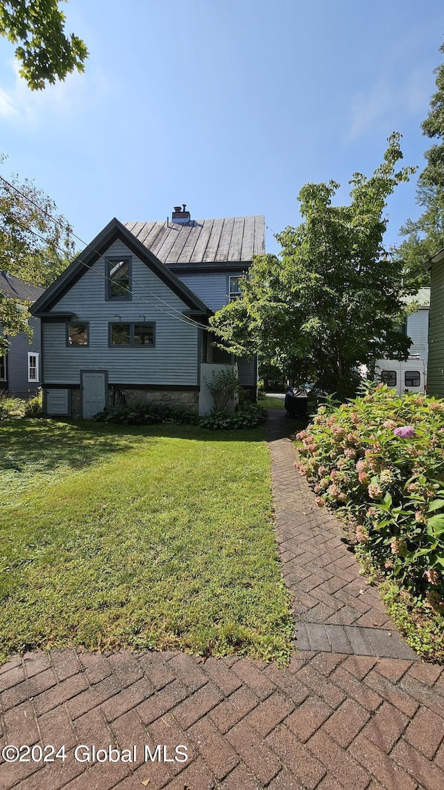 19 George St, Saratoga Springs, Inside, NY 12866 - view of property exterior featuring a lawn and a chimney